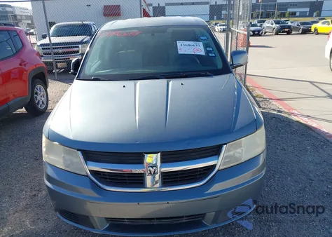 2009 Dodge Journey Sxt z USA, uszkodzony, nr VIN 3D4GG57V19T603440